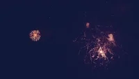 Fireworks. from a point, exploding in all directions.